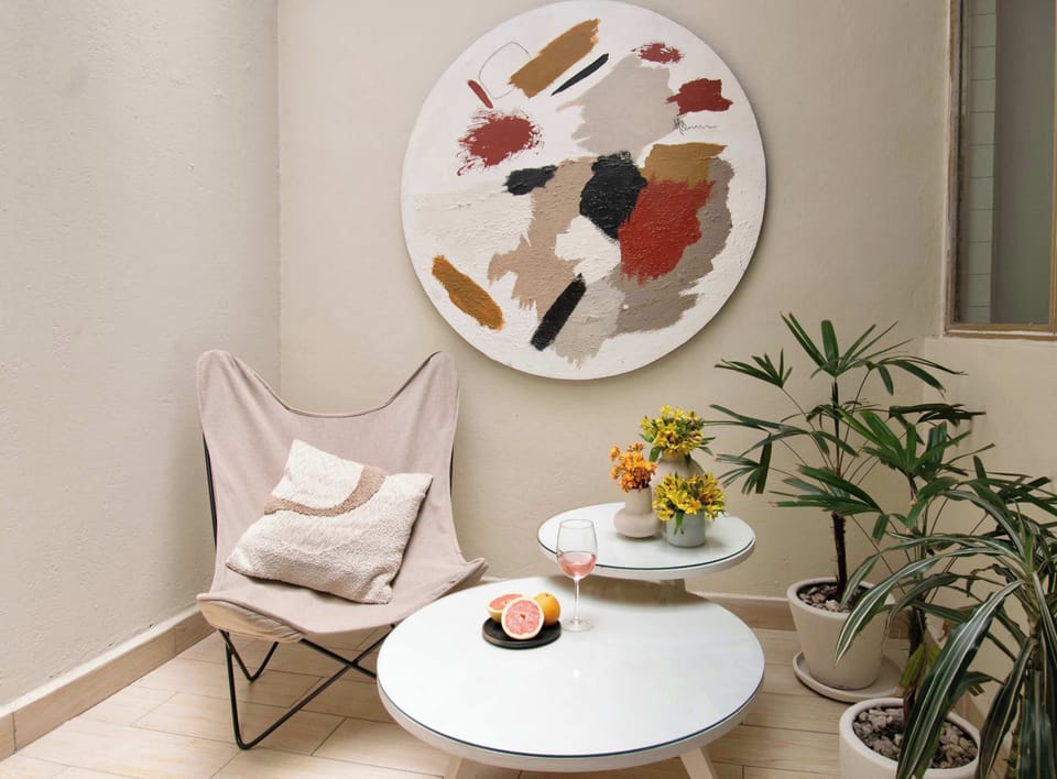 A private outdoor nook where you can sip your morning coffee, enjoy a glass of wine, or simply unwind between adventures around the city.
