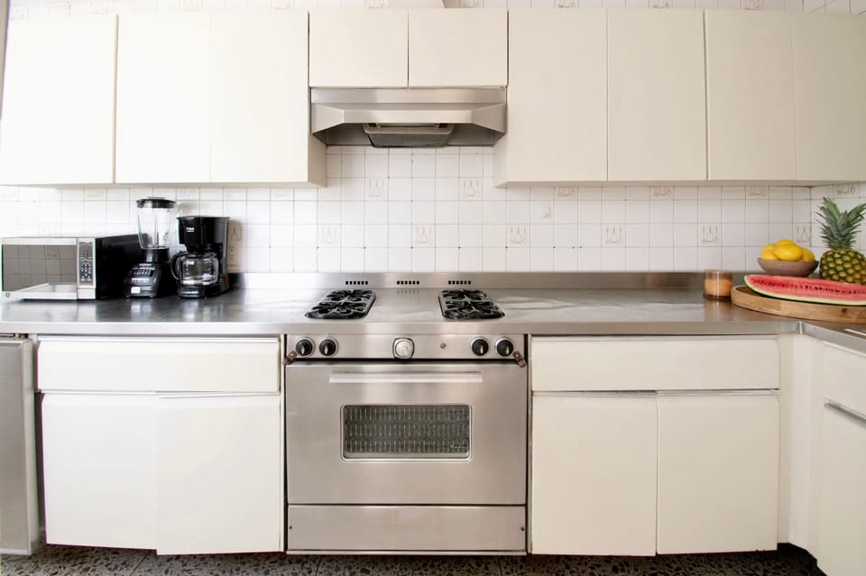 Whether you're preparing a homemade dinner or simply heating up delicious local takeout, this fully equipped kitchen makes every meal easy and convenient.