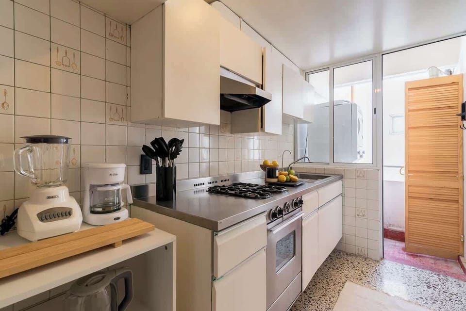 Experience the delight of culinary creations in our fully equipped kitchen, complete with essential supplies like coffee, oil, salt, pepper, and tea. Unleash your inner chef and savor every moment of preparing delicious meals with ease. 
