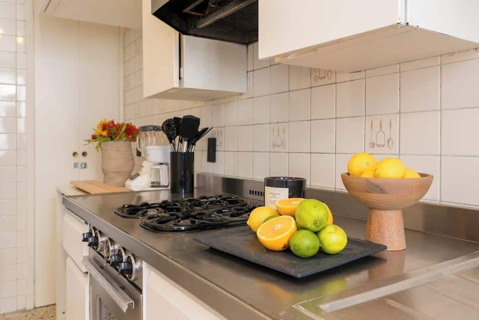 Experience the delight of culinary creations in our fully equipped kitchen, complete with essential supplies-g like coffee, oil, salt, pepper, and tea. Unleash your inner chef and savor every moment of preparing delicious meals with ease. 

