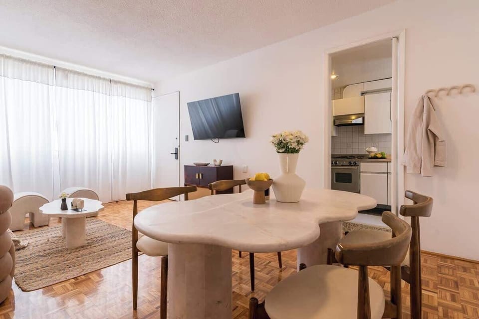 Delight in the pleasure of dining in our comfortable and inviting dining area. Experience the serene ambiance, enhanced by warm lighting, as you savor delicious meals and create cherished memories. 
