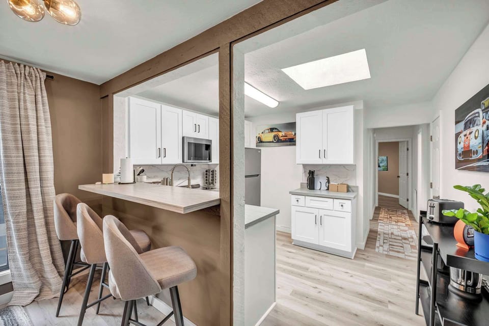 Bright dining nook tucked beside the kitchen, perfect for casual meals.
