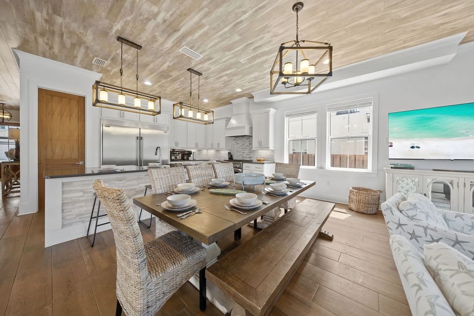 Gather the whole group at the 8-seat farmhouse table — breakfast, board games, or a birthday dinner, there's always room for everyone.