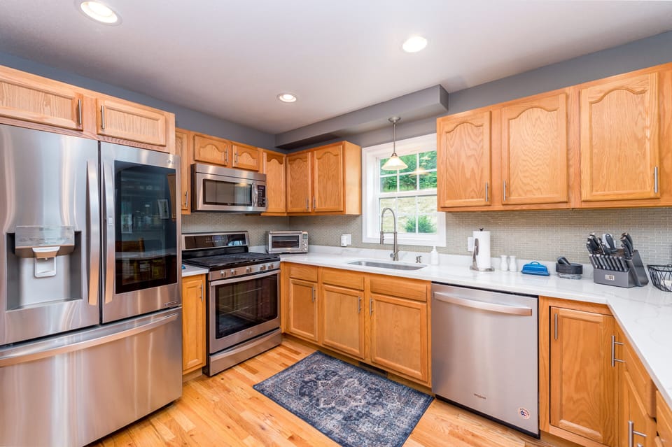 Bright modern kitchen with stainless appliances and ample counter space