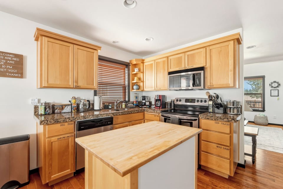 Kitchen: Stocked and labelled so that your culinary adventures are a breeze.