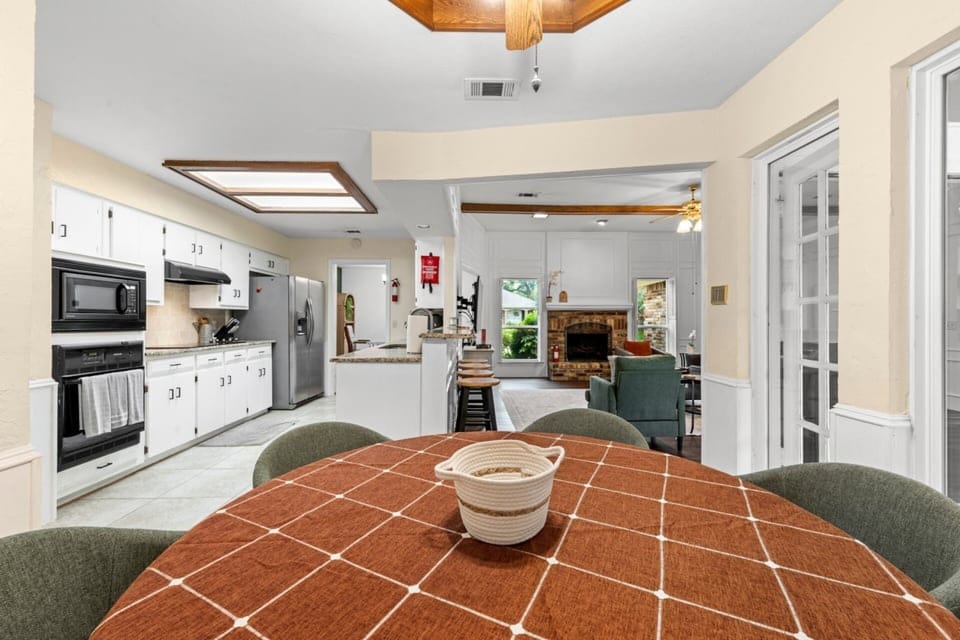 A seamless view from dining to living spaces, creating a natural flow throughout the home.