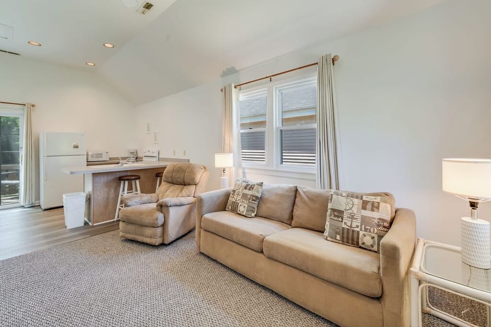 Relax in the Living Area with comfy furnishings and flat screen cable TV.