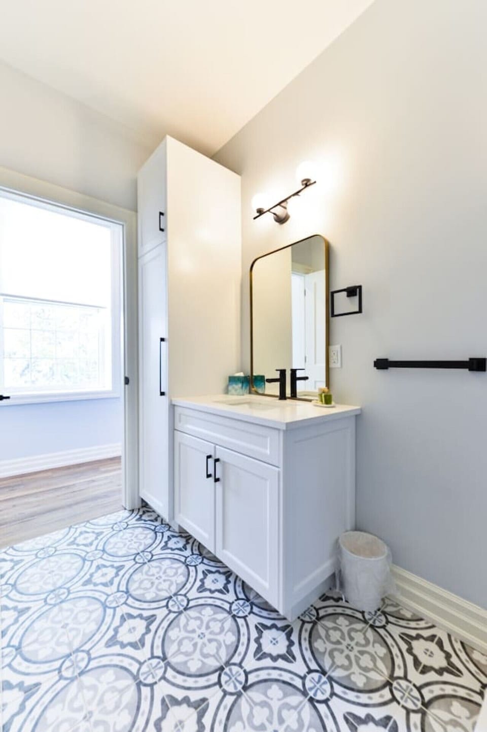 Refresh and recharge in the modern bathroom, featuring a walk-in shower, plush towels, and complimentary amenities for a comfortable stay.