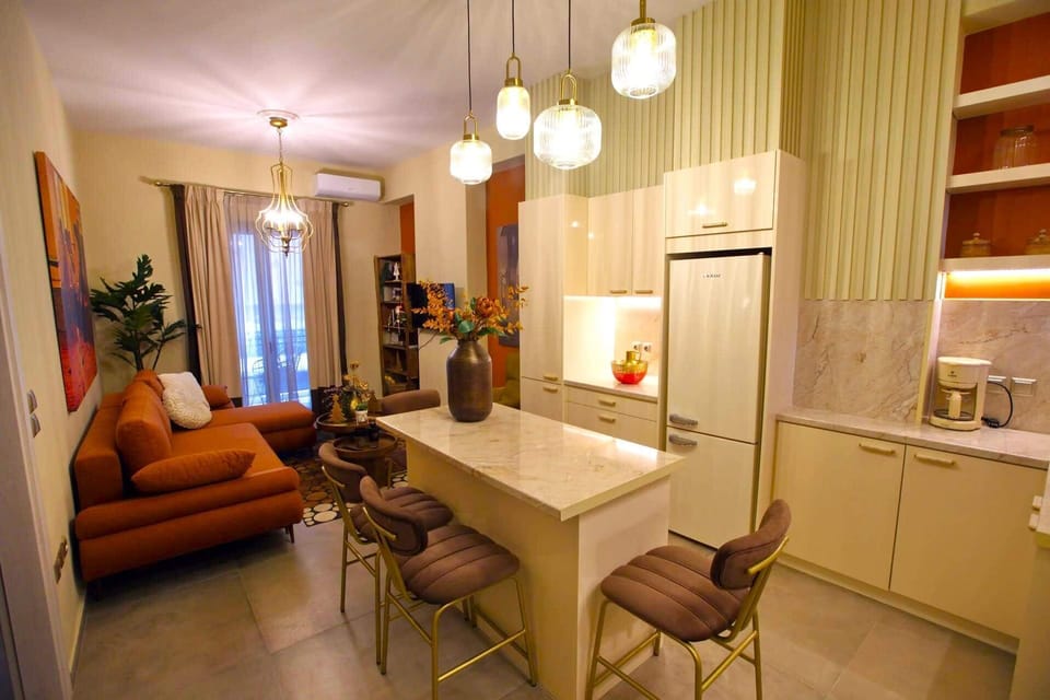 An open plan layout brings together the living area, dining space, and kitchen, creating a bright and welcoming setting that feels connected and easy to enjoy throughout the day.