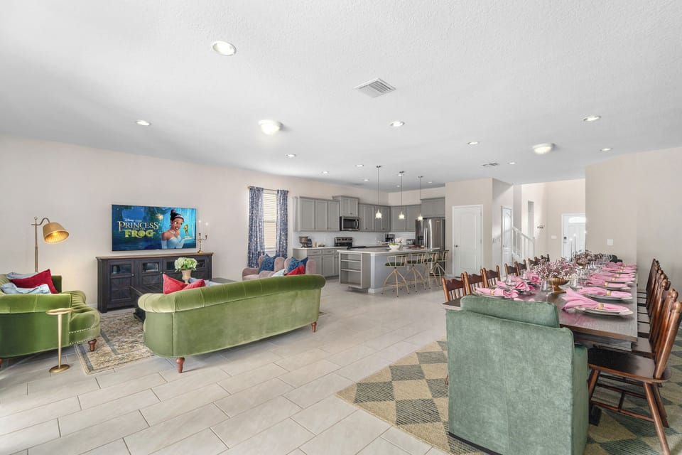 Open living area with kitchen view and princess storybook colors