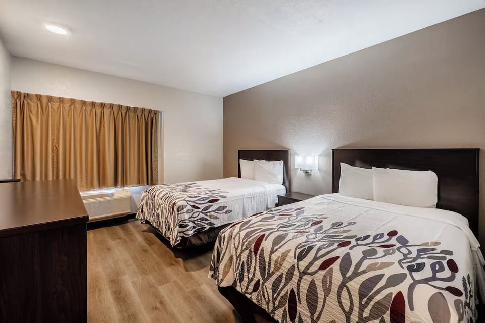 Relax in a clean, comfortable room designed for restful sleep.