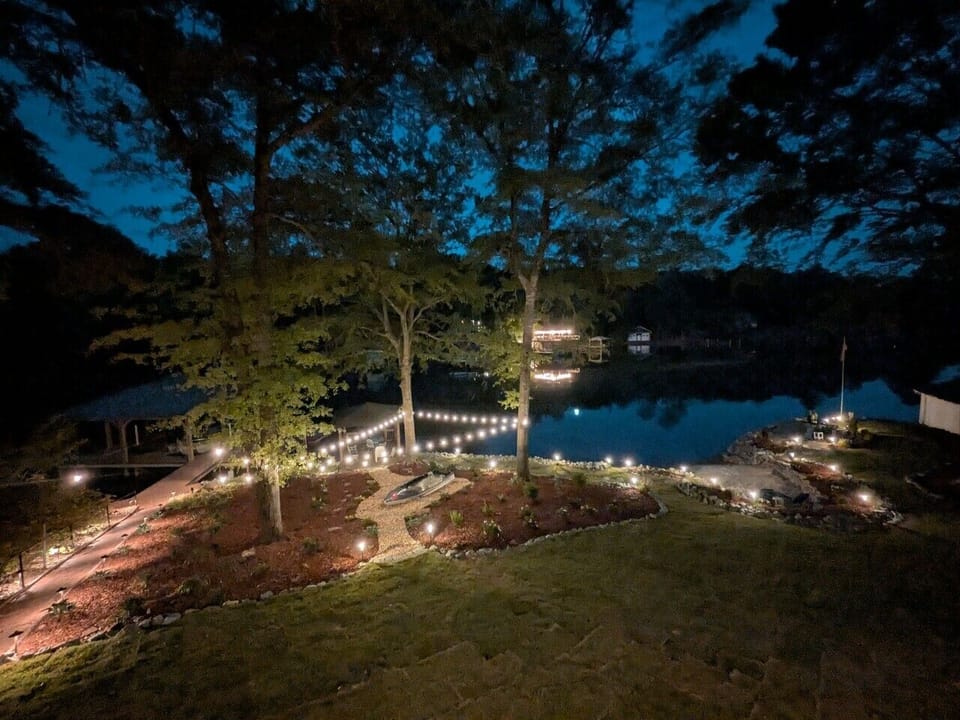 Lakefront Grounds | Landscape Lighting & Shoreline Path | Evening Water Views