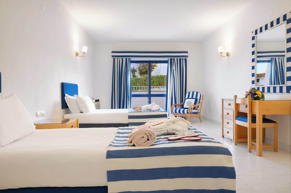 Bedroom. Interior and views may vary based on location and availability