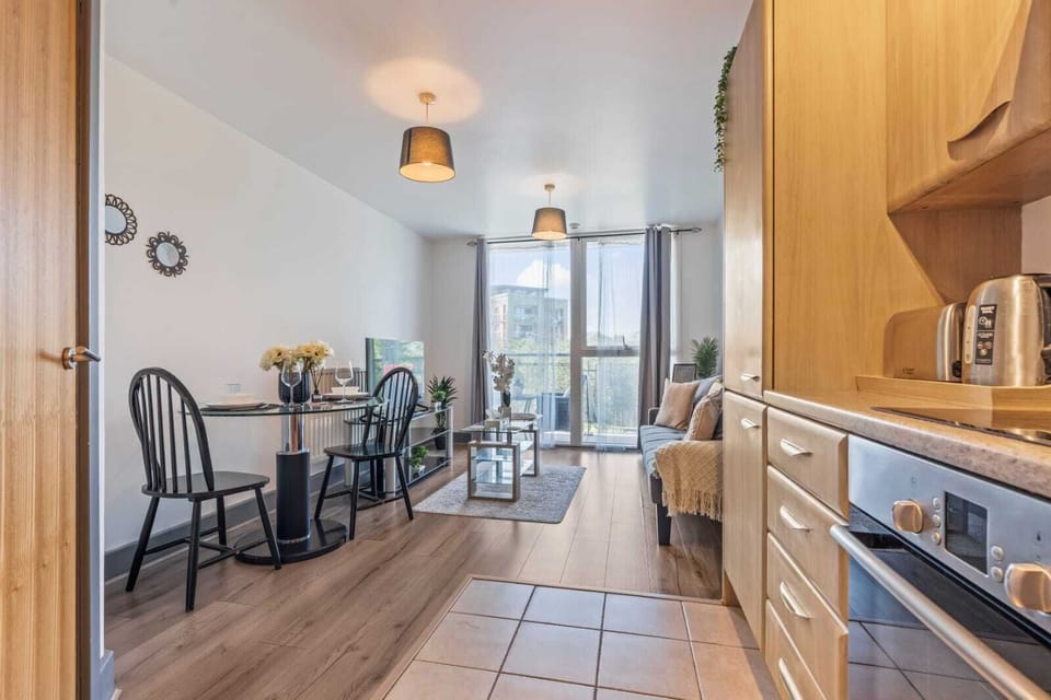 indoor dining, indoor, coffee and or coffee maker, kitchen, oven, stovetop