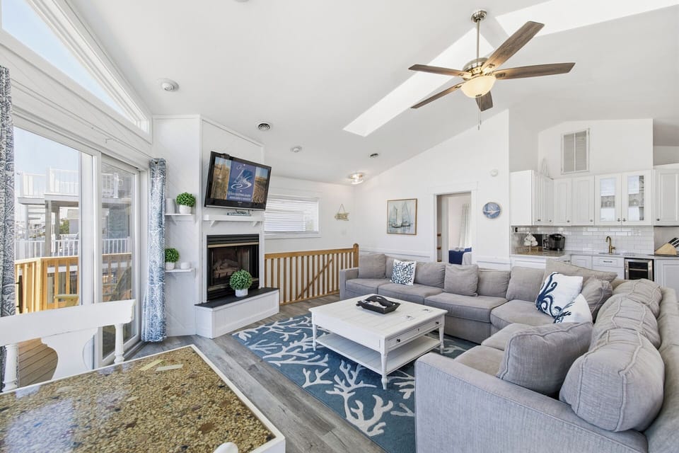 Top-Level Living Room with Deck Access