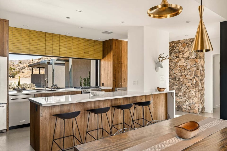 Open concept kitchen with breakfast bar.