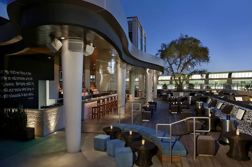 Toast the sunset with open-air drinks at the rooftop bar.