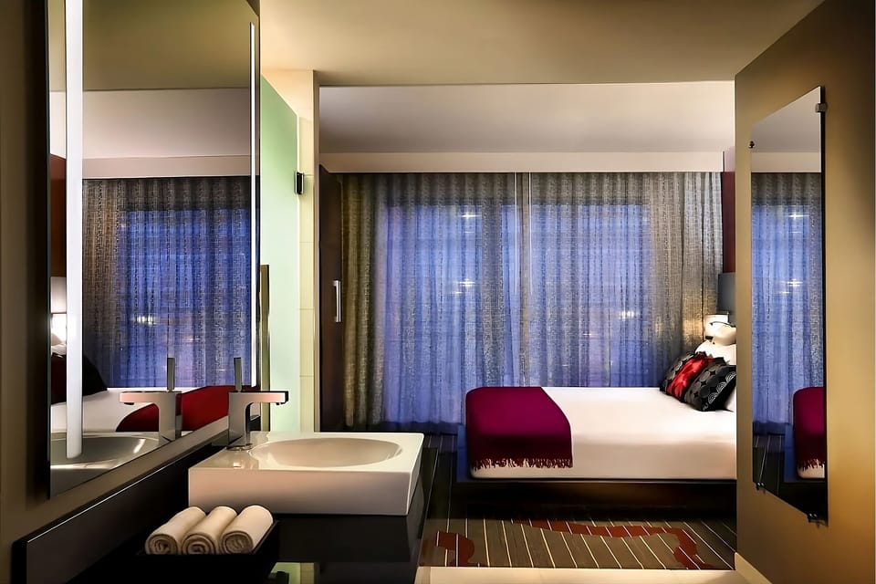 Ease into mornings with a spa-like vanity beside the bedroom.