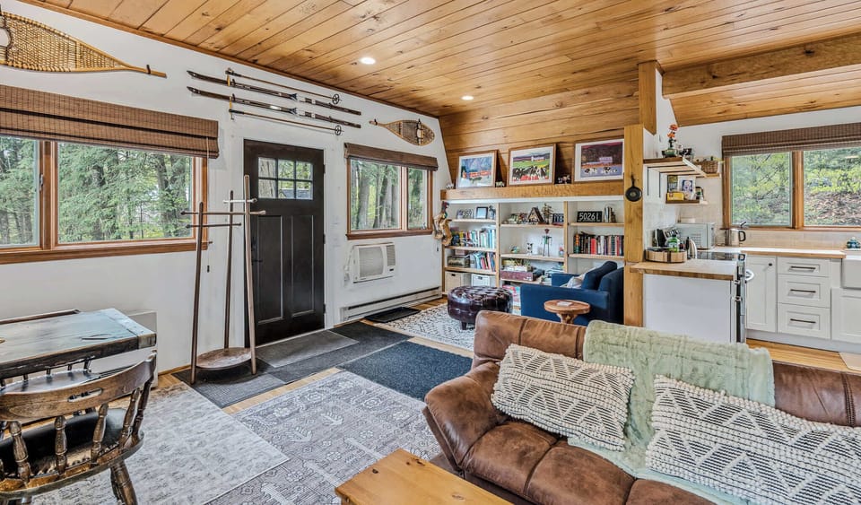 Entry-level open plan showing front door and kitchen