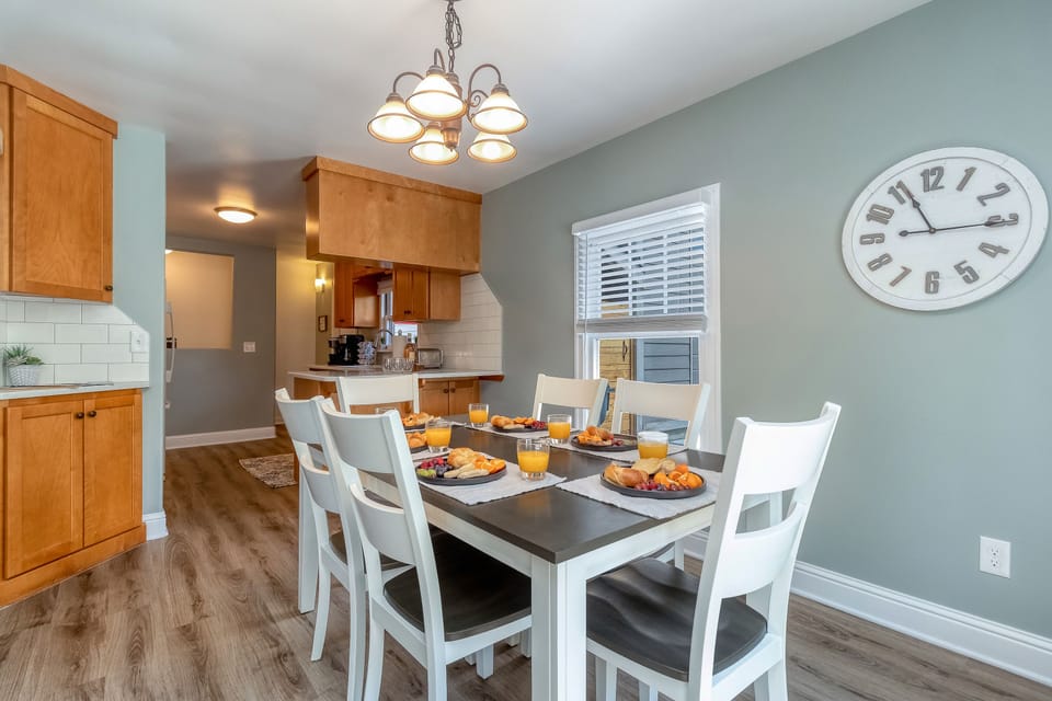 Dining table for six, ideal for shared meals, games, and conversation.
