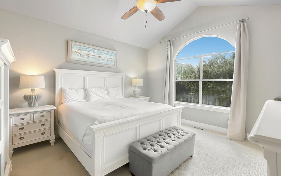 The primary bedroom features a king bed and an ensuite bathroom.