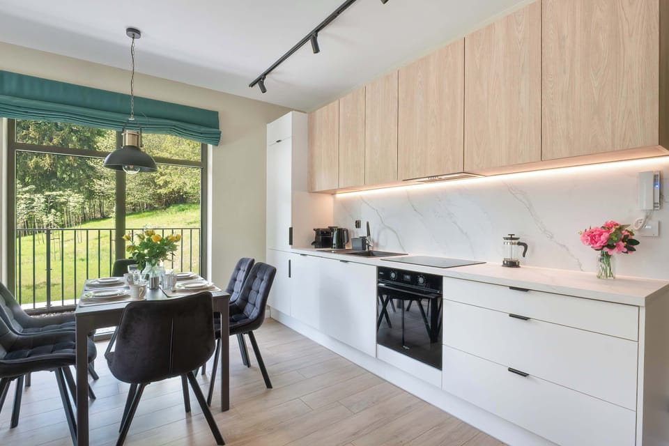 The fully equipped kitchenette includes everything you need for a home-cooked meal.