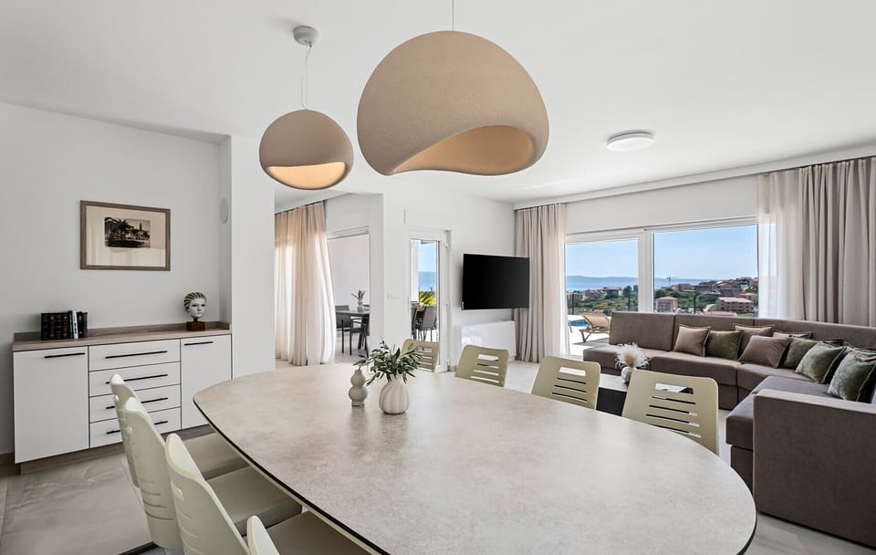 Comfortable dining area for 10 people with breathtaking sea views