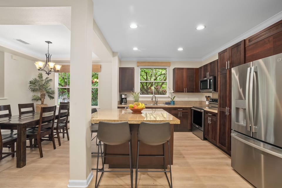 Gather in the spacious kitchen with generous prep space and room for shared moments.