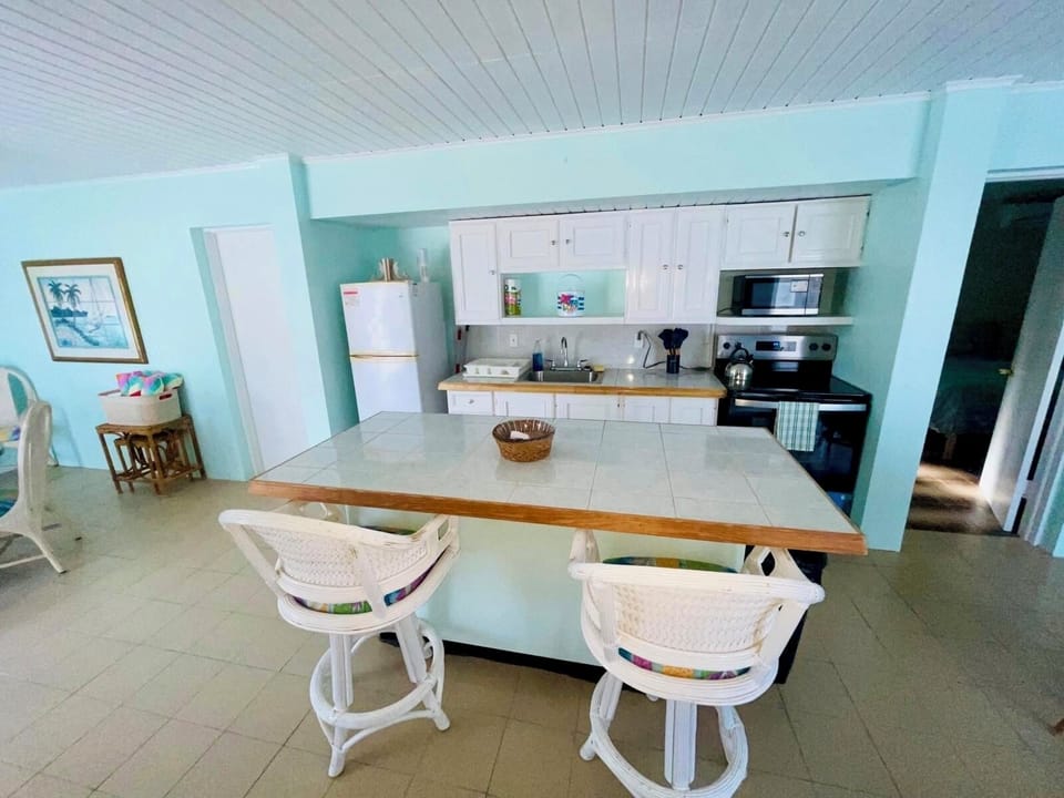Extra seating in the bright kitchen.