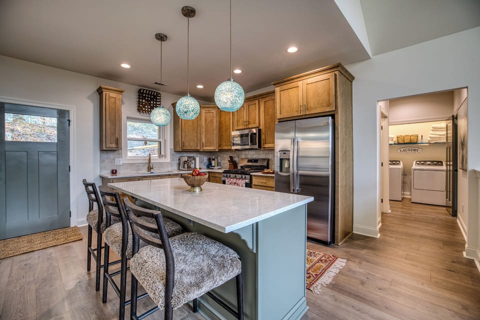 Kitchen island with seating for three and space to gather.