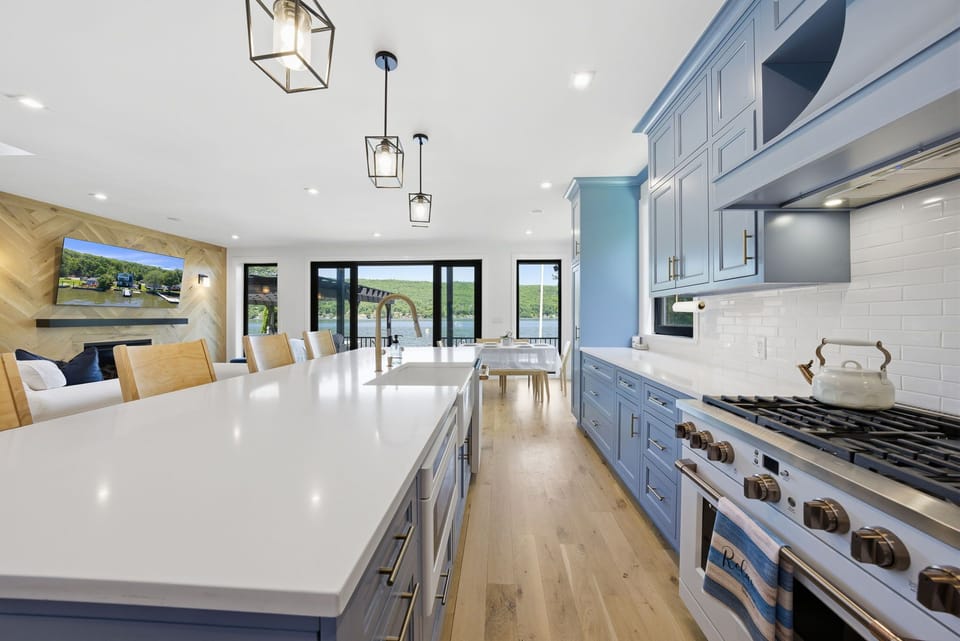 Fully renovated chef’s kitchen with custom cabinetry and premium appliances.