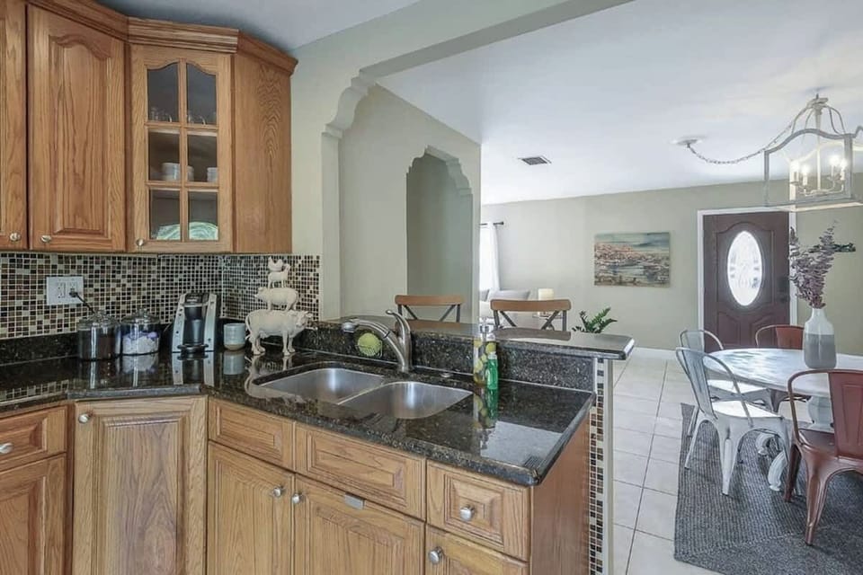 Kitchen Delight: Whip up culinary creations in this stylish kitchen with charming décor!