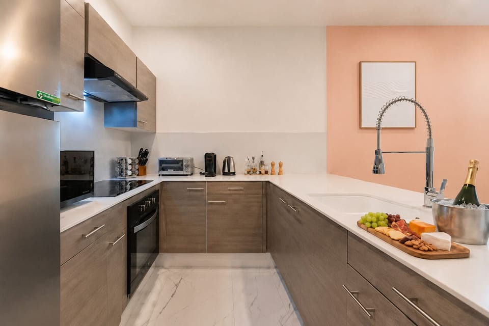 Fully equipped kitchen with elegant finishes and a relaxed vacation-ready setup