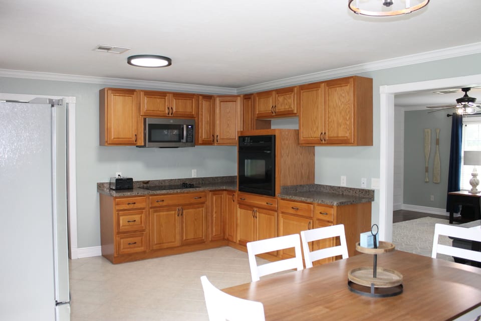 Kitchen flows nicely into family room 