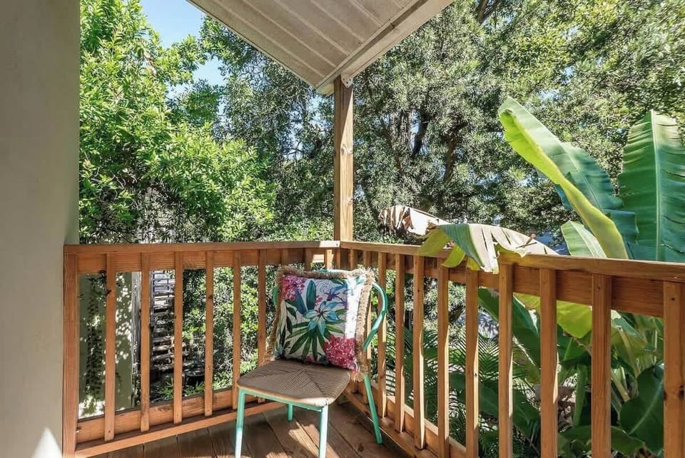 Balcony Oasis: Enjoy refreshing views and tropical vibes from your private outdoor retreat!