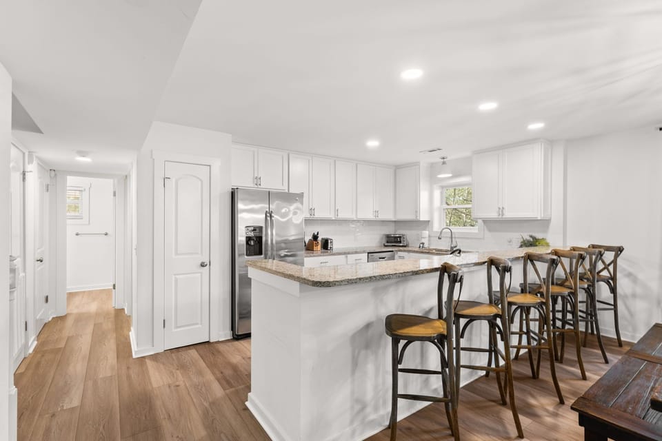 Bright and open dining space seamlessly connected to the kitchen, making it easy to serve up family favorites.