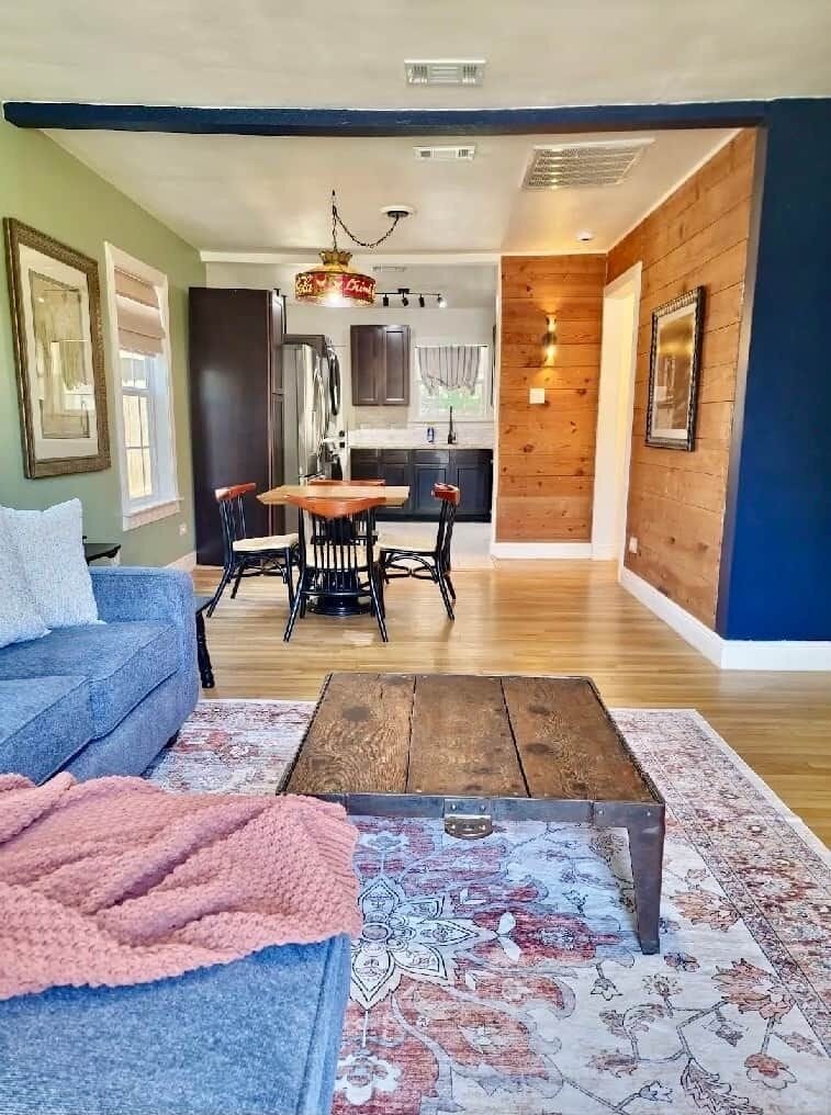 Open living area designed for relaxation with comfortable seating and Smart TV.