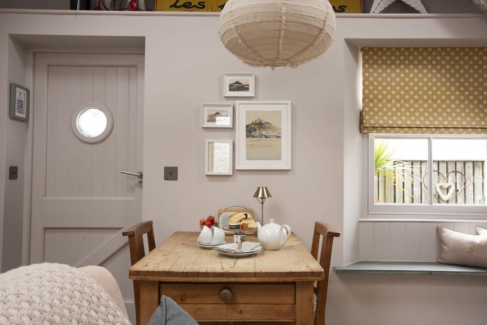 Dining table for 2 people within living area - The store Room