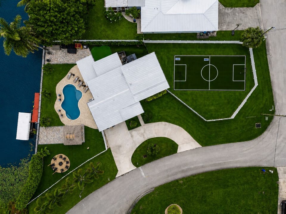 Soccer field, sauna, fire pit, tiki, pool, hot tub, putting green, what more could you want in a vacation home!