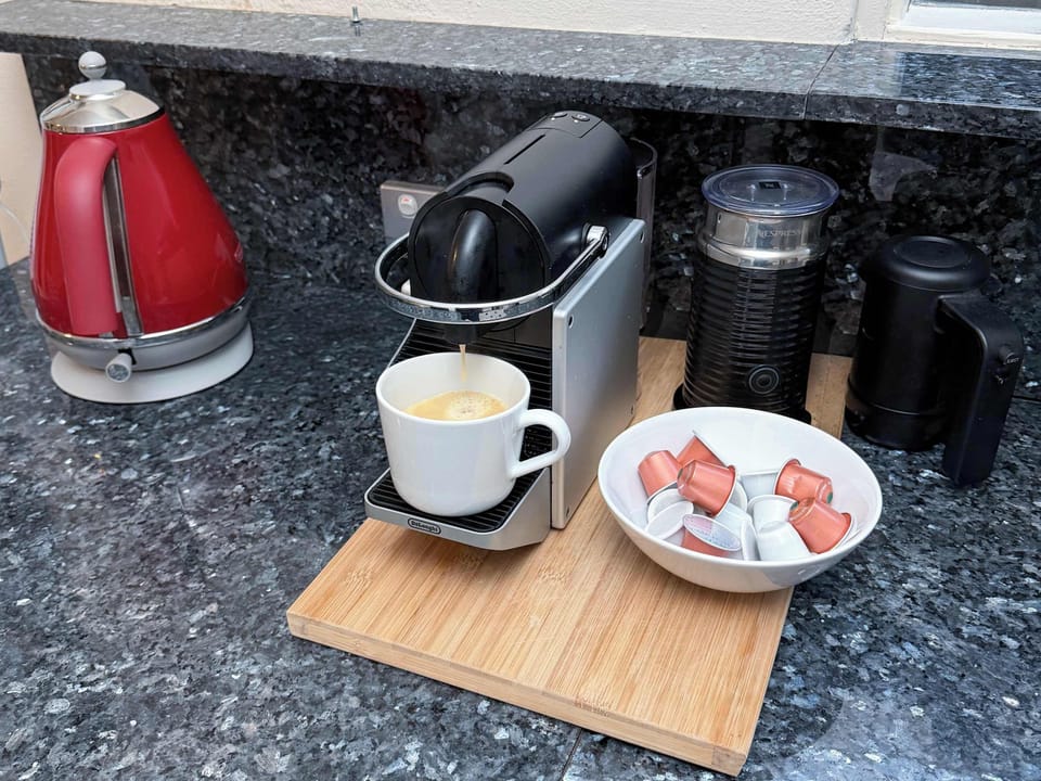Tea / Coffee station with a an espresso machine and you can froth your own milk too!