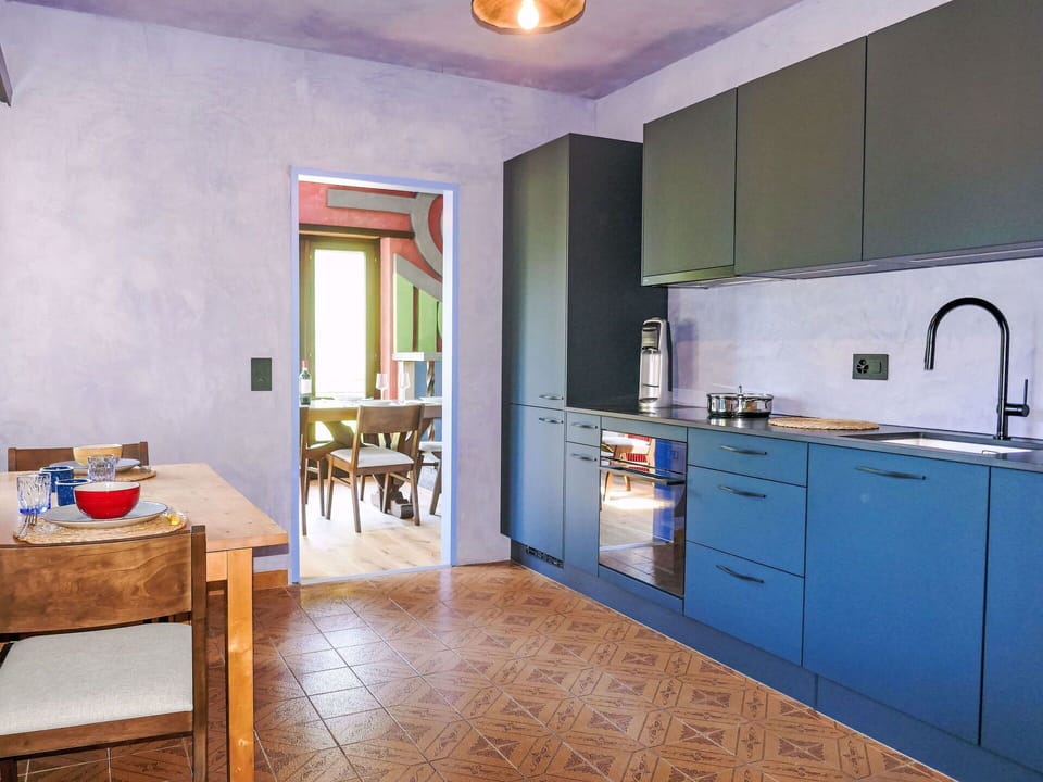 Furniture, Flooring, Interior Design, Wood, Kitchen, Floor, Countertop, Ceiling, Cabinetry, Lighting