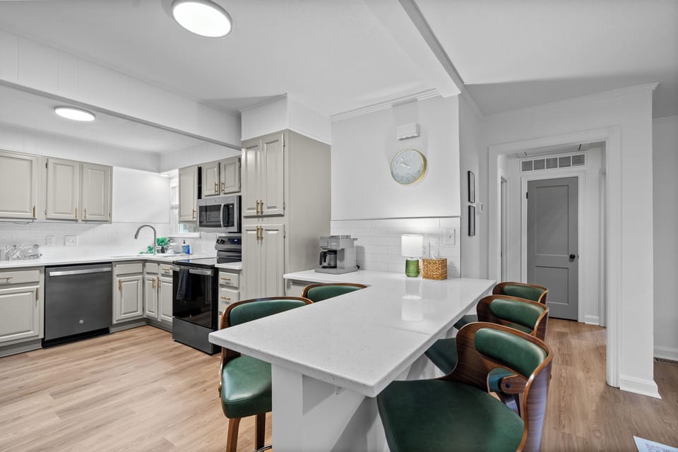 Modern kitchen with breakfast bar and stylish seating