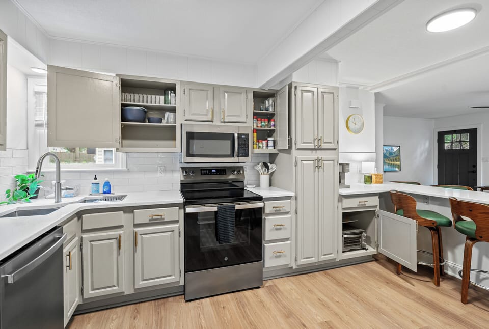Bright updated kitchen with breakfast bar and ample storage