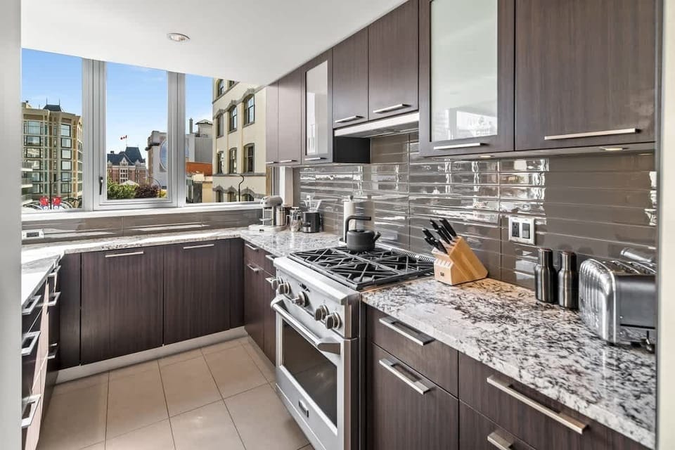 Chef style kitchen is fully equipped with all cooking essentials.