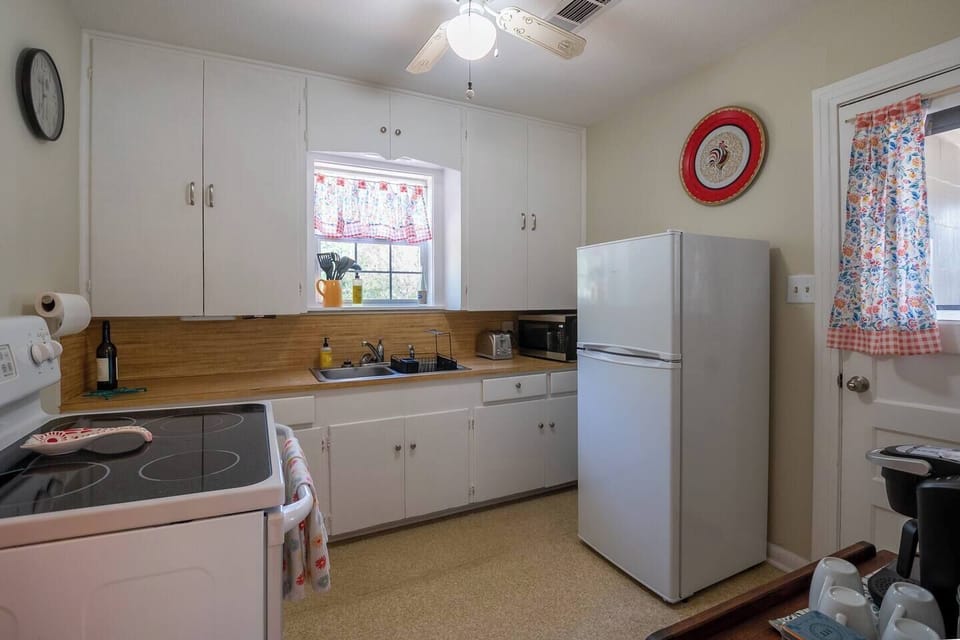 Our little kitchen has all you need to whip up a quick snack or a full meal. Our fridge is stocked with waters and plenty room for your groceries and beverages.
