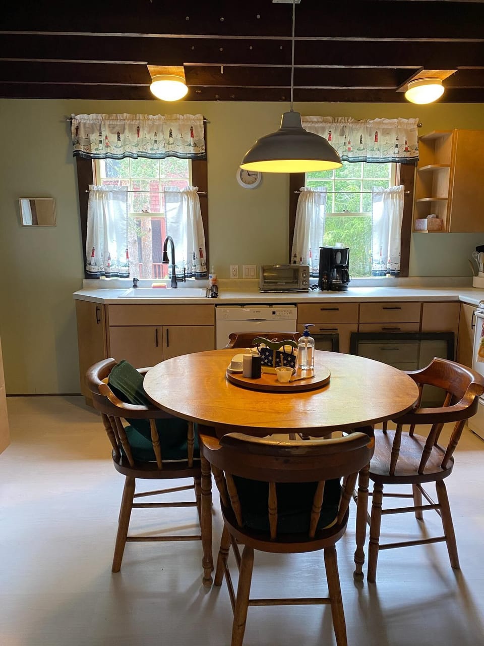 Kitchen, coffee maker,dining table, disposal, dishwasher, stove