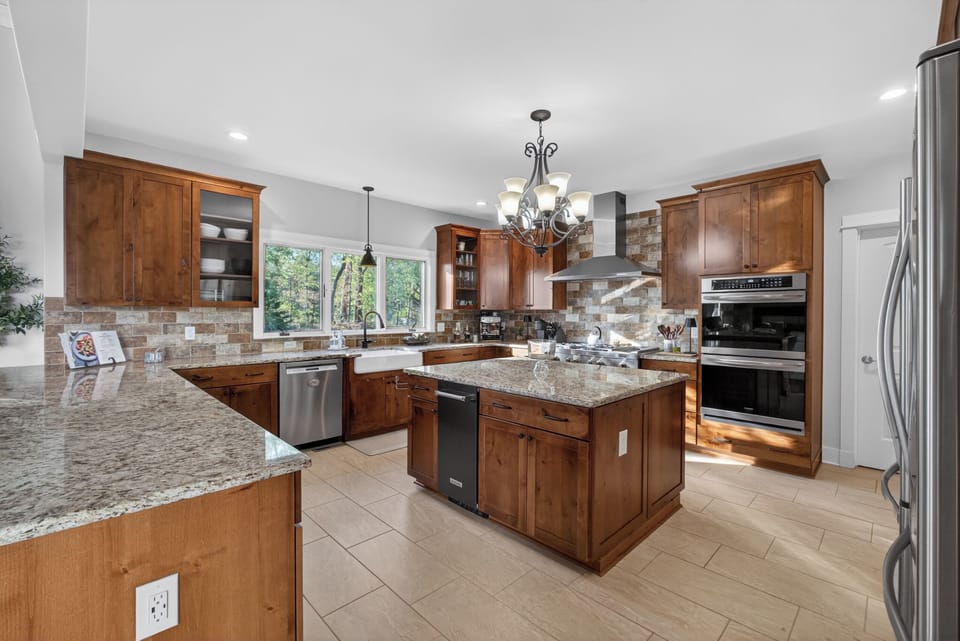 Spacious chef's kitchen with oversized island for gathering