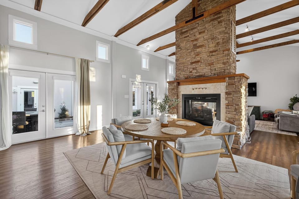 Dine with a cozy fireplace backdrop