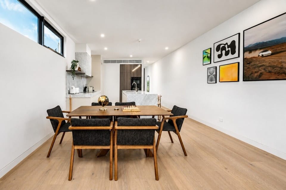 A wide, open dining space that keeps everyone connected to the kitchen action.