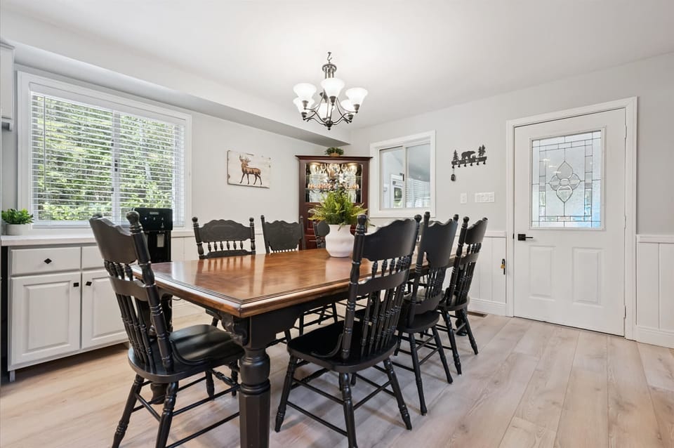 Spacious dining area with seating for the whole group — perfect for shared meals, games, and gatherings.